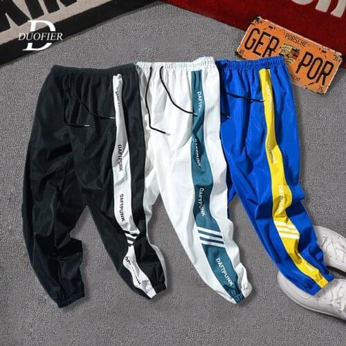 Mens Joggers Casual Pants Fitness Men Sportswear Tracksuit Bottoms Skinny Sweatpants Trousers Gyms Letter Printing Track Pants