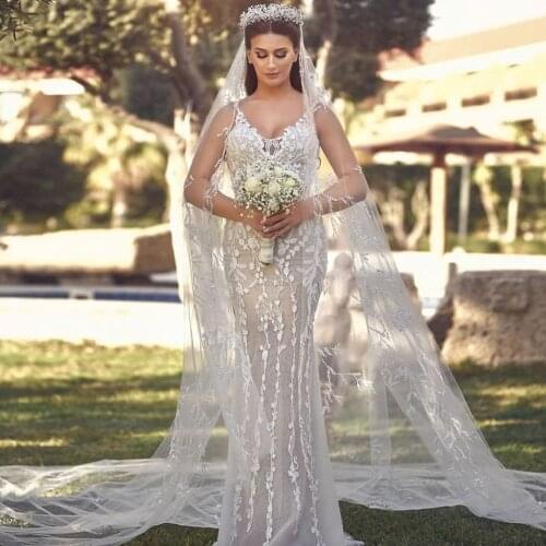 Luxury Spaghetti Straps Backless Saudi Arabic Mermaid Wedding Dress With Detachable Train Appliques Lace Dubai Bridal Gown