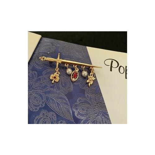 European and American vintage Medieval swords and multiple pendant brooches