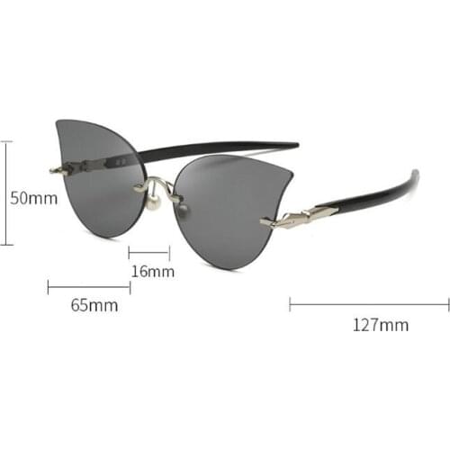 Retro frameless sunglasses cat eye metal pen leg cross - border sunglasses female American hipster ocean sun glasses