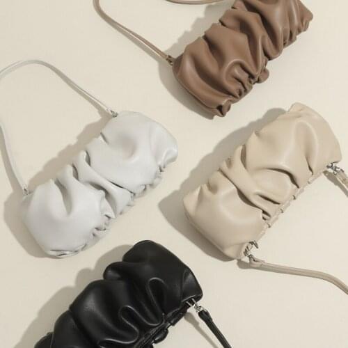 2021 winter new European and American niche style leather shoulder handbag fold solid color dumpling bag