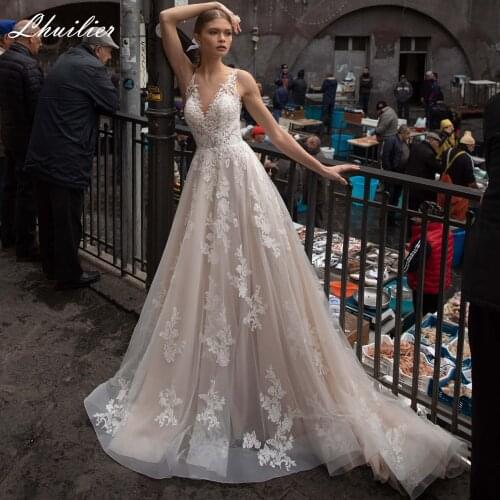 Lhuilier A-line V-neck Tulle Champagne Wedding Dresses 2020 Court Train Sleeveless Lace Appliques Bridal Dress with Open Back