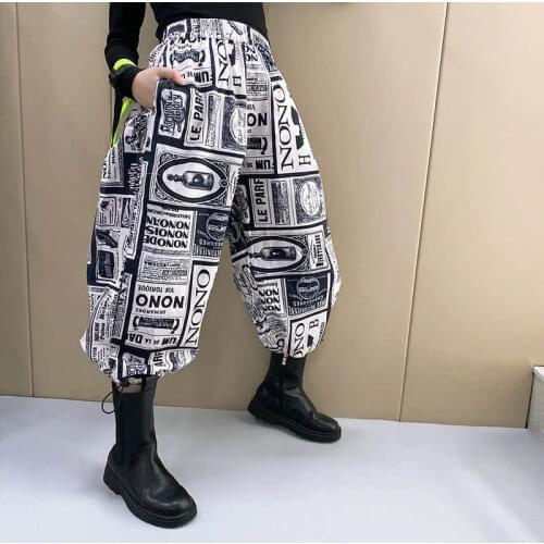 Boys' and girls' hip hop newspaper printed mosquito proof pants 2021 summer new Korean version Zhongda childrens radish lantern