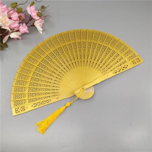 6-inch color high-quality fragrant wood fan wholesale hollow folding fan wedding gift side bone customization can add fringe