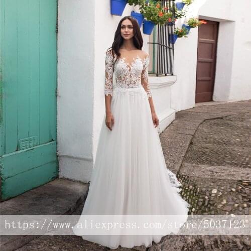 Tulle A Line Wedding Dresses 2020 Scoop Lace Appliques Long Sleeves Sweep Train Bridal Gowns Vestidos de Noivas Illusion