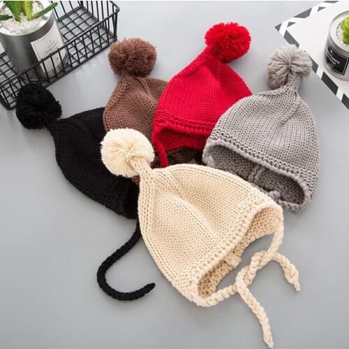 Fashion Baby Beanies with poms Warm and windproof Knit hats Cute Solid Crochet Woolen hat 0-4YEARS