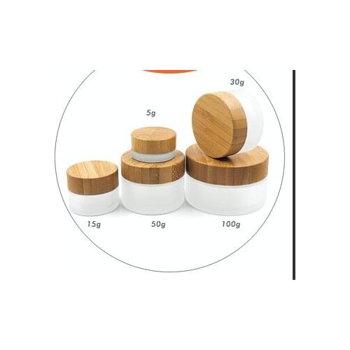 Cosmetic 30ml 50ml flat shoulder frosted cream jar with bamboo lotion pump lid Glass Perfume Wooden Bamboo Cap Sprayer Bottle