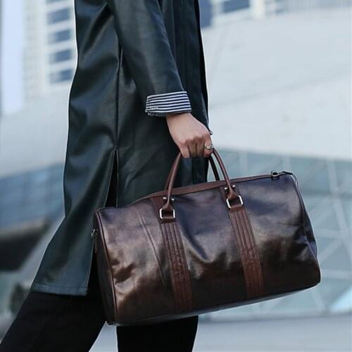 Retro trend travel bag mens handbag leather large capacity short travel business bag mens shoulder messenger bags
