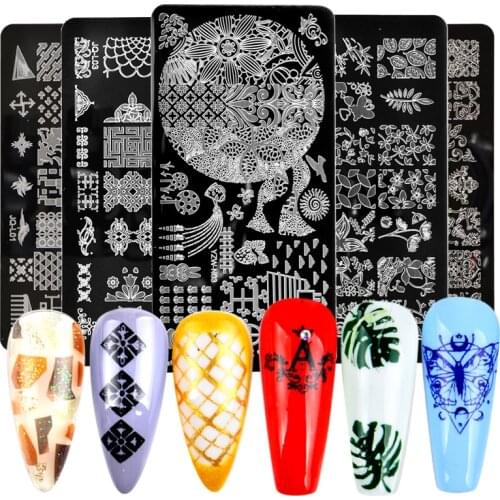 YWK 1pcs Nail Stamping Plates Leaf Flowers Butterfly Cat Nail Art Stamp Templates Stencils Design Polish Manicure
