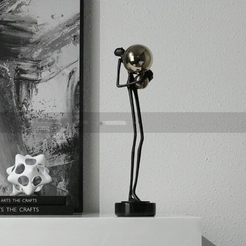 Modern Living Room Soft Outfit Holding Gold Ball Character Sculpture For Hotel Exhibition Hall Metal Art Decoration Accessories