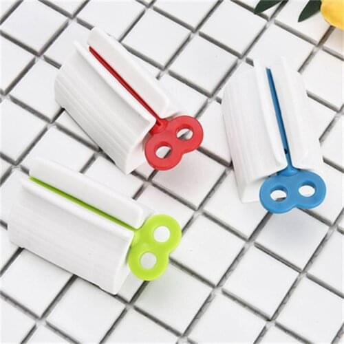 ToothPaste Squeezer Toothpaste Dispenser Tube Squeezer Facial convenient Cleanser Press Rolling Holder Bathroom Accessories