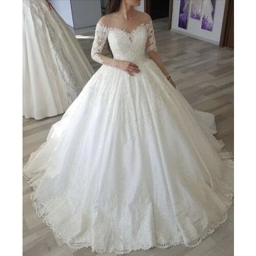 Sheer Neck Full Sleeves Floor Length Tulle Lace Applique Ball Gown Wedding Dresses Long Sleeves Lace Bride Gowns Lace Up Back