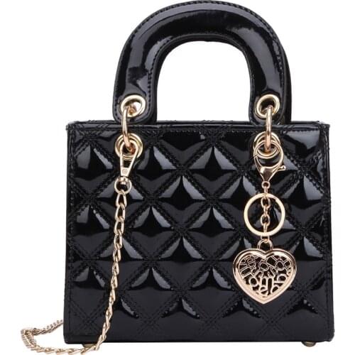 2020 embroidered rhombus patent leather retro hand ladle shoulder Messenger bag pure color PU leather women bag