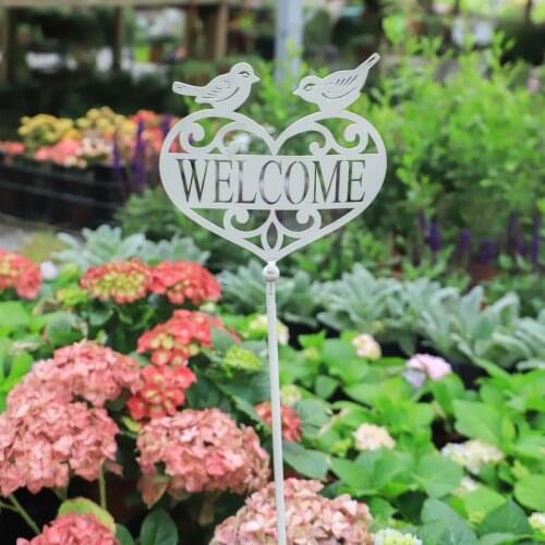 Insert metal white garden welcome sign