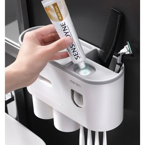 New Magnetic adsorption inverted toothbrush holder with dual automatic toothpaste squeezer dispenser storage rack