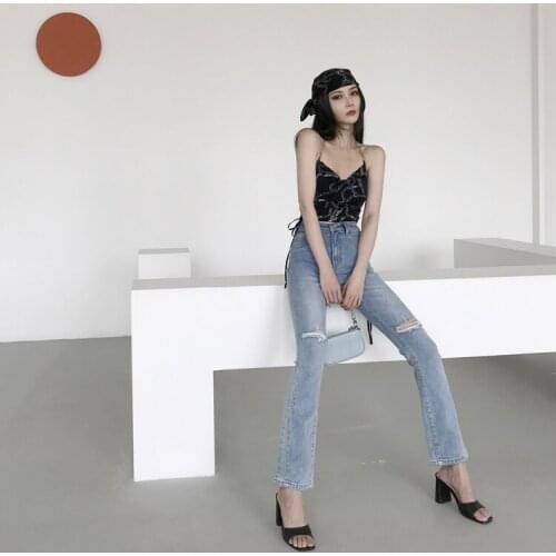 Leixin original hot girl pants vibe wind high waist slim bag hip horn hole cowboy pants European and American street shooting