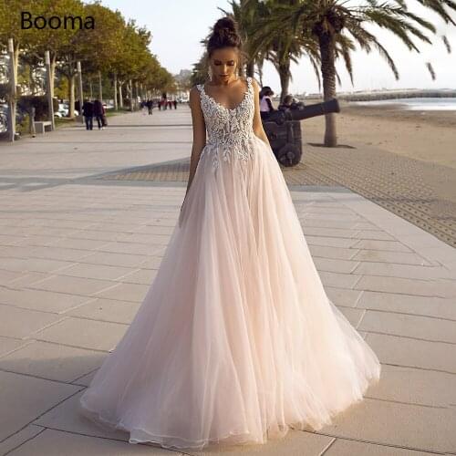 Blush V-Neck Princess Wedding Dresses Spaghetti Straps Appliques Beach Bride Dresses Open Back Illusion A-Line Bridal Gowns