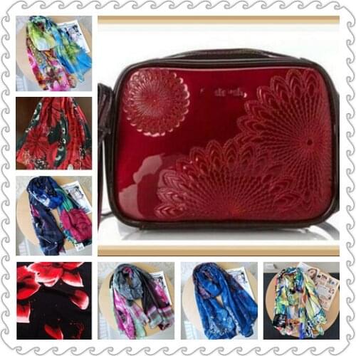 Venta al por mayor, España Original Bolso de mano de charol con flores para mujer, bandolera con borlas