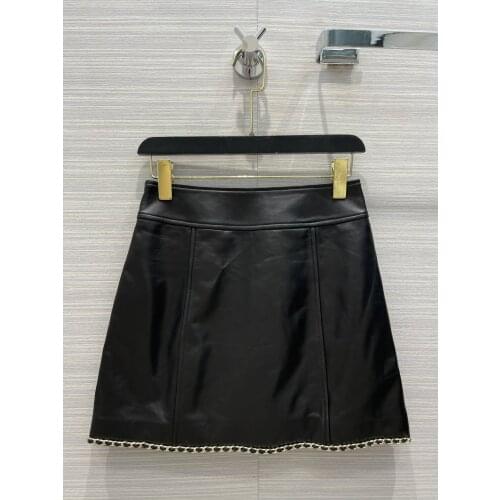 Fashion 2021 new ladies sexy solid color chain small leather skirt 0315