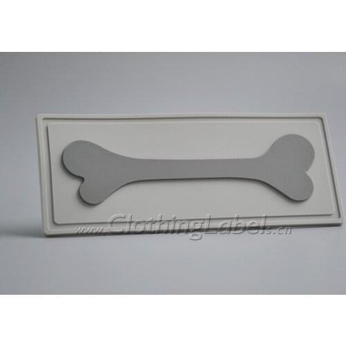 Custom PVC labels for clothing, bags, shoes etc., embossed logo, groove line for sew in fabric, low MOQ, high quality