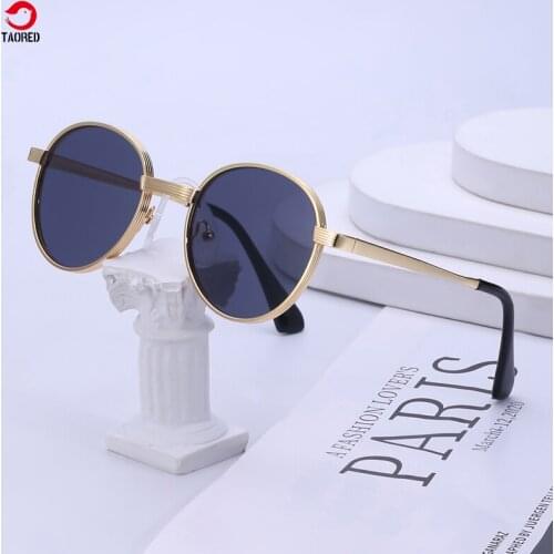 Woman trendy fashion sunglasses Europe and America round classic metal pattern outdoor man retro luxury brand design TAORED