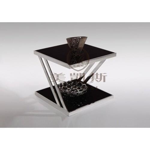 Toughened glass tea table.. Stainless steel small square table. The sofa side table. Flower