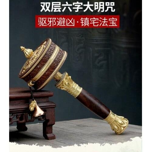 Large Greco-Buddhist Tibet Nepal Temple Buddhism recite chant scriptures Om mani padme hum Mantra Turning Scripture prayer wheel