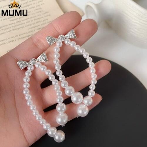 Elegant wild fashion exaggerated long rhinestone pearl bow pearl pendant earrings female 2021 trend earrings