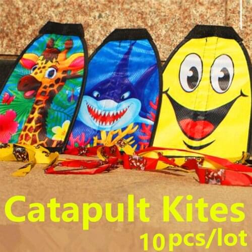 Free shipping 50pcs/lot catapult kites for kids fun factory outdoor toys for children flying windsock eagle bird kite bar carpe