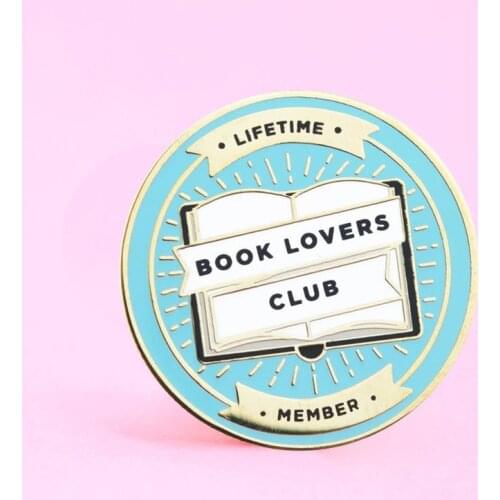 Bibliophiles, Join The Book Lovers Club With This Shiny Pin! Let the world know that you're dedicated to late night reads