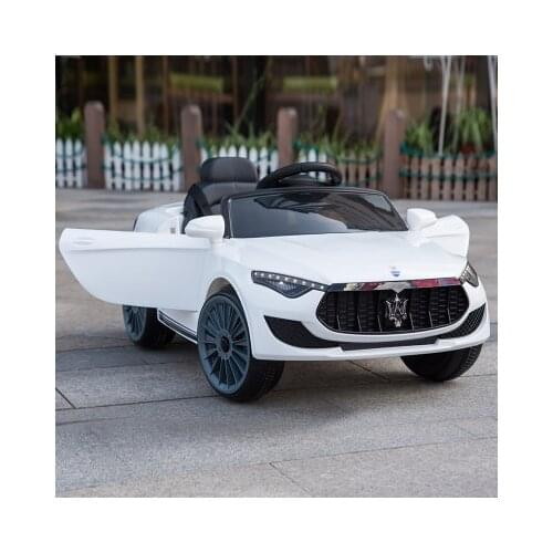 Special price Childrens electric dual drive car kids four-wheel remote control can sit vehicle baby swing toy with push rod