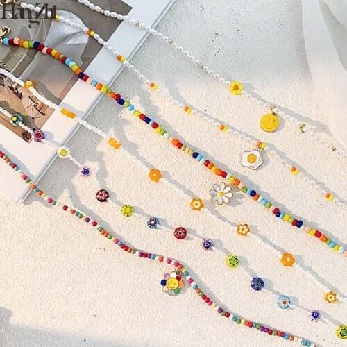 HangZhi 2021 New Colorful Glazed Bohemia Simple Flowers Smiley Little Daisy Pendant Beaded Necklace for Women Party Jewellery