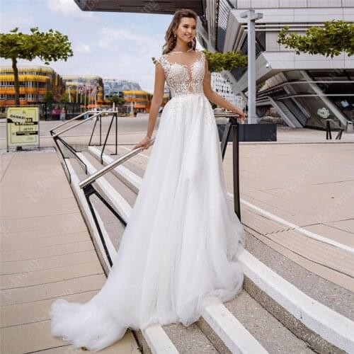 A-line Wedding Dresses 2020 Charming O-neck Cap Sleeve Custom Made Applique Tulle Bridal Gowns for Bride with Train Vestidos