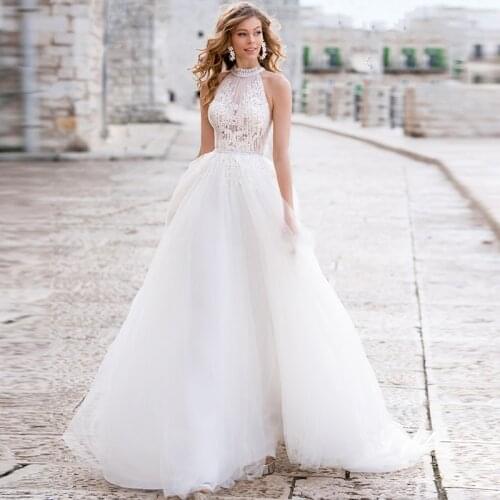 Tulle Wedding Dresses 2020 Beading Halter Sleeveless Lace Appliques Button A Line Bridal Gowns Vestido De Noiva