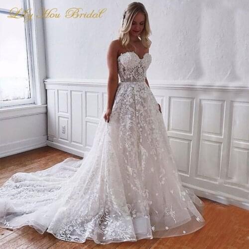 Wedding Gowns 2020 Sweetheart Sleeveless Lace Appliques Illusion A Line Bridal Dresses Sweep Train