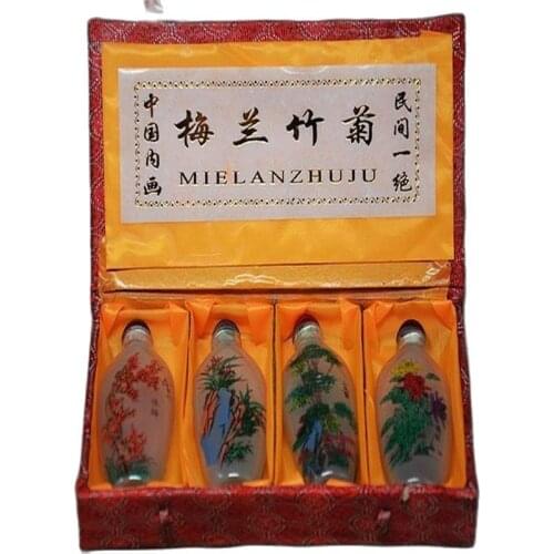 Hand painted plum, orchid, chrysanthemum and bamboo in Chinese glass Snuff Bottle