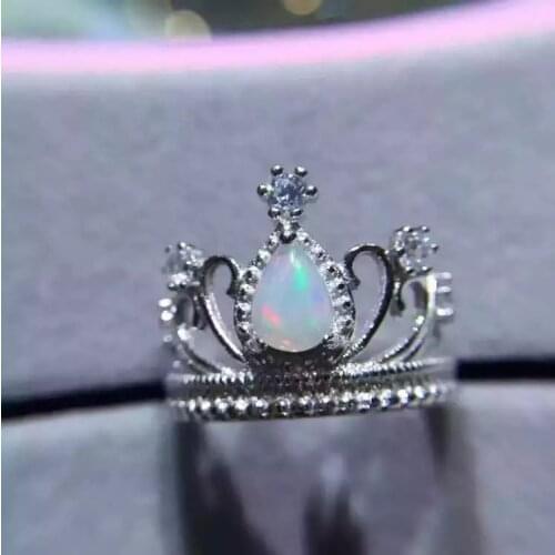 Crown style opal gemstone ring with silver