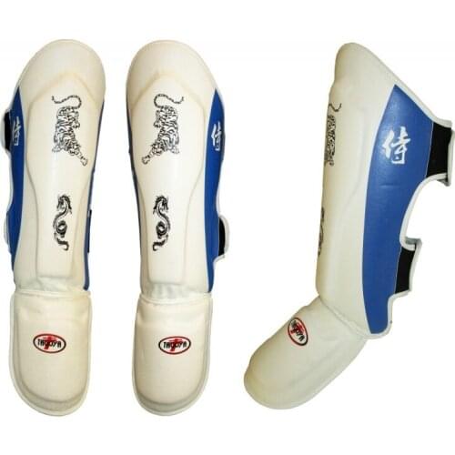 White shin guards with high quality instep and resistance for muay thay kick boxing high intensity workouts