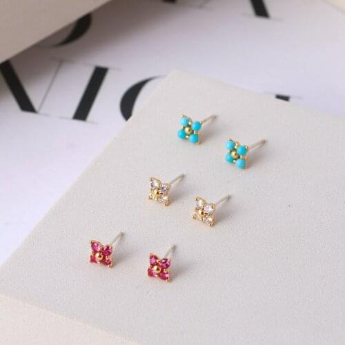 Small fresh girl heart is simple four-petal flowers inlaid with shining color small mini earrings