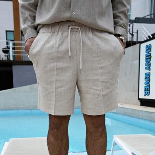 Korean mens new summer solid color lace up straight tube fashion cotton linen shorts thin loose casual beach pants