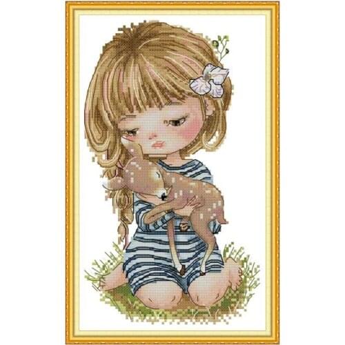 Girl holding a fawn cross stitch kit aida 14ct 11ct count printed canvas stitches embroidery DIY handmade needlework