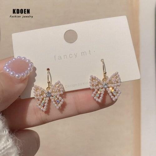 Elegant Temperament Pearl Bow Pendant Dangle Earrings For Woman 2020 New Fashion Jewelry Wedding Party Girls Unusual Earrings