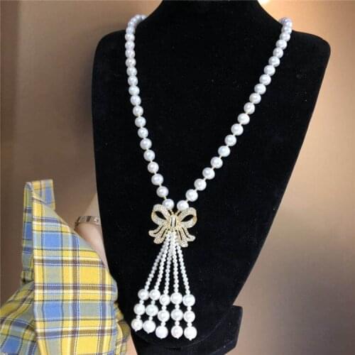 Hot sell 70cm 8-9mm White freshwater pearl micro inlay zircon bowknot long tassel sweater chain necklace fine jewelry