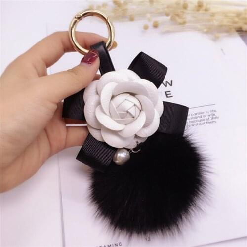 2020 New creative Camellia bow keychain ladies fox fur ball key ring fashion ornaments bag pendant