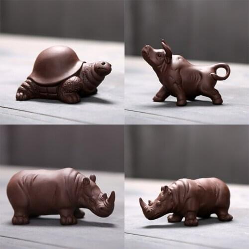 Purple sand handmade tea pet pieces rhinoceros set pieces turtle tea play ox spirit sky can raise plate household Modern home