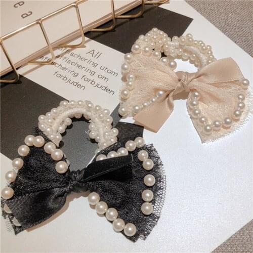 Hair accessories scrunchies with pearls Bow hairband Simple joker hair rope European and American ladies love hair circle most