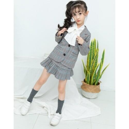 Fashionable and fashionable New childrens clothing new girls spring and autumn plaid suit jacket + skirt two-piece