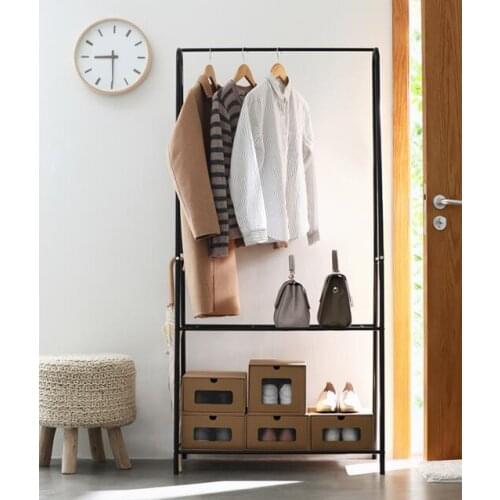 A clothing store display rack. Iron art movable fitting room. A simple outdoor dressing room
