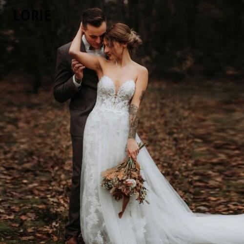 LORIE Bohemian Wedding Dresses 2021 Off Shoulder A Line Lace Appliqued Boho Wedding Gowns Backless Beach Bridal Gowns
