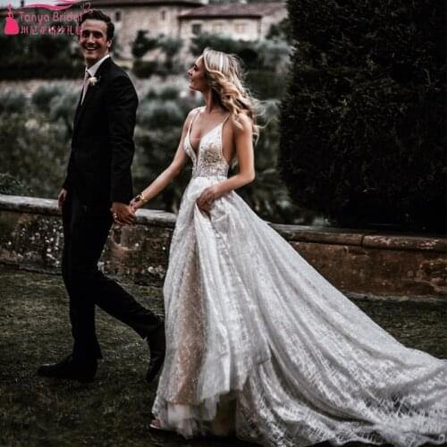 Striking Lace Wedding Dresses 2019 Fashion Bohemian Beach Bridal Gowns Deep V-Neck Spain Beauty Vestido De Noiva ZW145